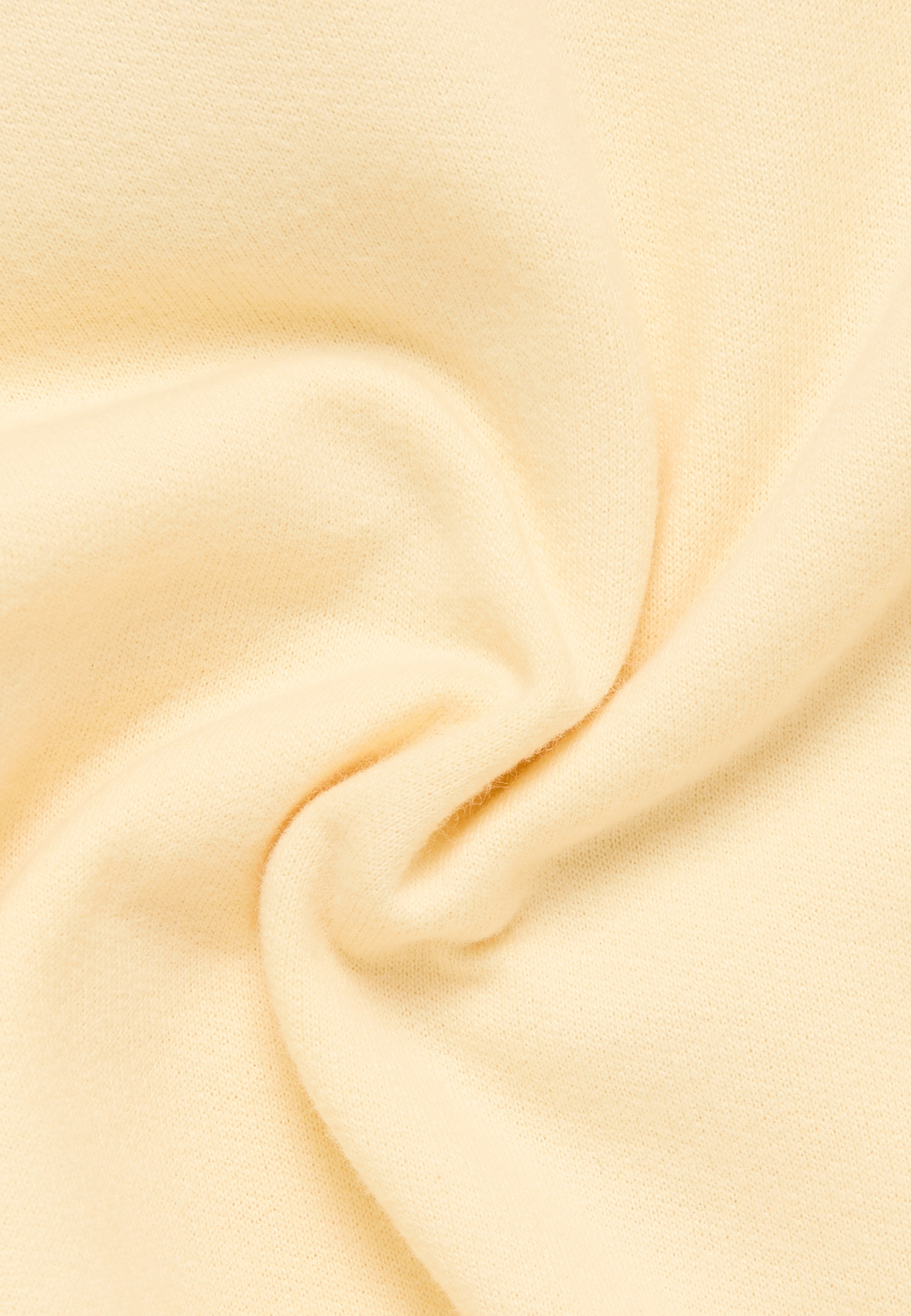 Gebreide pullover in geel vlakte
